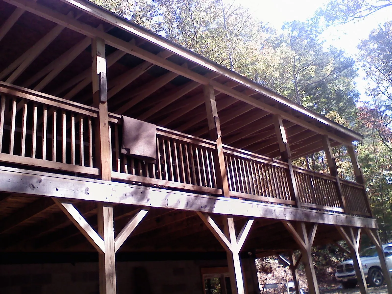 Timber framing under a new elevated porch and deck — Roof Leak Repair in Caney by Roofing Brothers